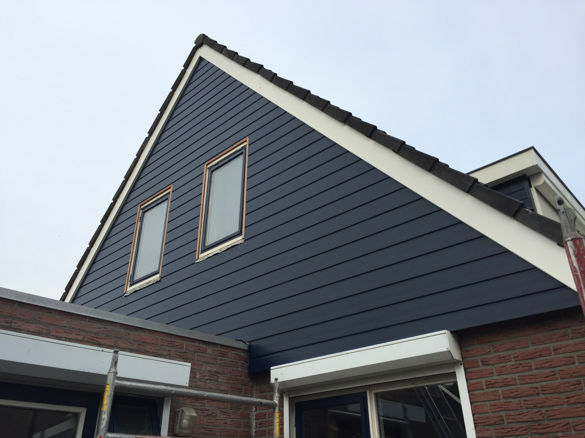 Gevelrenovatie woning met nieuwe voegen